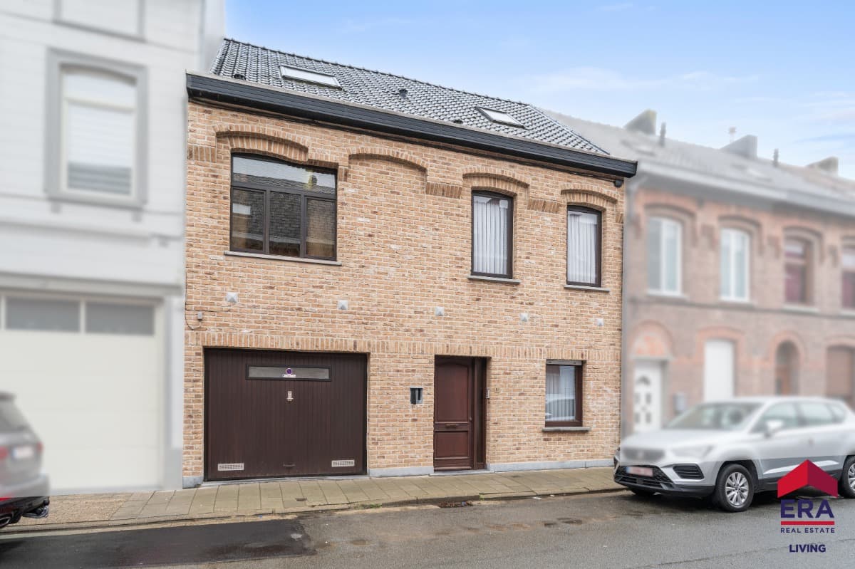 Ruime woning met 5 slaapkamers, garage en tuin nabij centrum